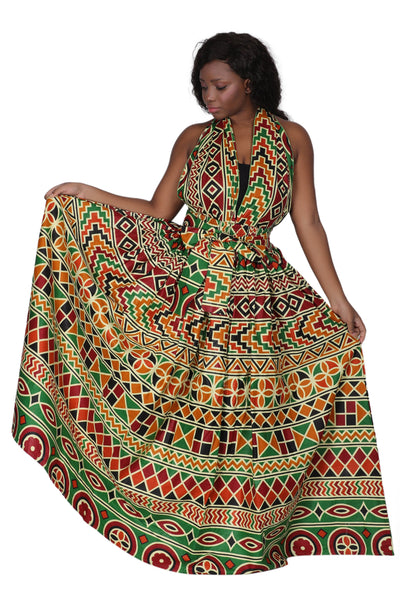 Woman wearing an African Print Skirt with a scarf tied around her tanktop.
